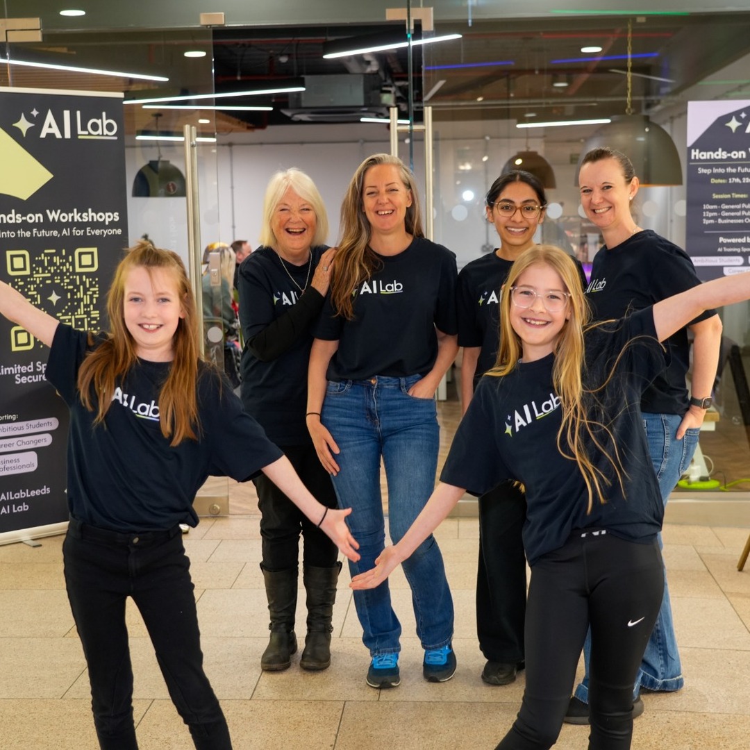 AI Lab community members wearing AI Lab t-shirts at a hands-on event in Leeds
